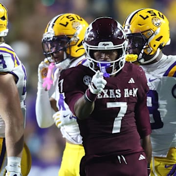 Texas A&M Aggies wide receiver KC Concepcion (7) celebrates after a first down during the first half against the Louisiana State Tigers at Tiger Stadium. 