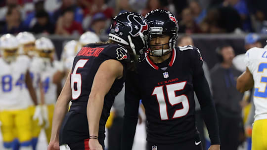 Jan 11, 2025; Houston, Texas, USA;  Houston Texans punter Ka'imi Fairbairn (15) celebrates a field goal with punter Tommy Townsend (6) against the Los Angeles Chargers in the third quarter in an AFC wild card game at NRG Stadium. Mandatory Credit: Thomas Shea-Imagn Images