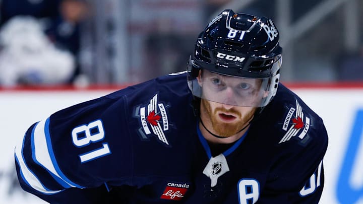 Sep 27, 2025; Winnipeg, Manitoba, CAN;  Winnipeg Jets forward Kyle Connor (81) awaits the face off against the Calgary Flames during the second period at Canada Life Centre. Mandatory Credit: Terrence Lee-Imagn Images