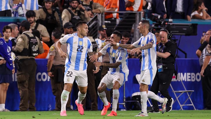 Jul 14, 2024; Miami, FL, USA;  Argentina forward Lautaro Martínez (22) celebrates after scoring a goal against Colombia.