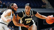 Butler Bulldogs forward Riley Makalusky (2) defends Purdue Boilermakers forward Mila Reynolds (15) 