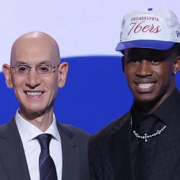 Jun 25, 2025; Brooklyn, NY, USA;  VJ Edgecombe stands with NBA commissioner Adam Silver after being selected as the third pick by the Philadelphia 76ers in the first round of the 2025 NBA Draft at Barclays Center. Mandatory Credit: Brad Penner-Imagn Images