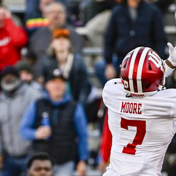 Indiana safety Louis Moore intercepts a pass intended for Maryland receiver Kaleb Webb on Nov. 1, 2025, at SECU Stadium.