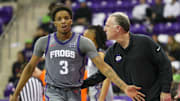 Vasean Allette receives encouragement from TCU head coach Jamie Dixon.