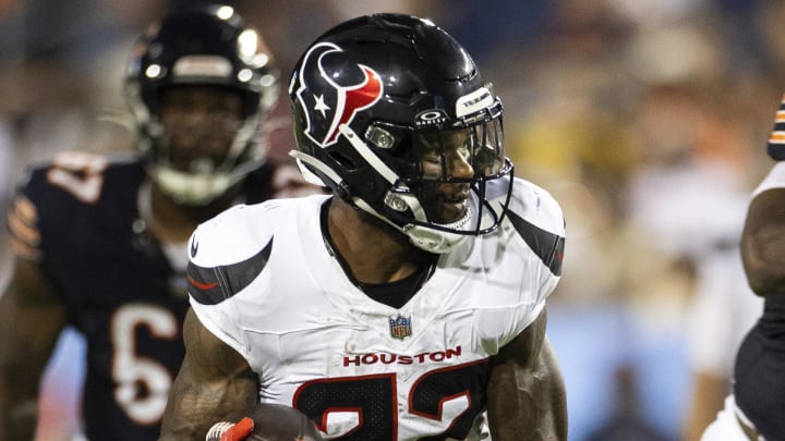 Aug 1, 2024; Canton, Ohio, USA; Houston Texans running back Cam Akers (22) runs the ball against the Chicago Bears during the second quarter at Tom Benson Hall of Fame Stadium. Mandatory Credit: Scott Galvin-USA TODAY Sports