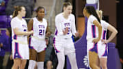 Feb. 11, 2025-TCU players gather after a timeout in a 79-47 win over BYU.