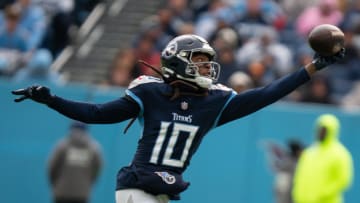 Tennessee Titans wide receiver DeAndre Hopkins (10) hauls in a one-handed grab against Jacksonville Jaguars cornerback Darious Williams (31) in the first quarter of their game at Nissan Stadium in Nashville, Tenn., Sunday, Jan. 7, 2024.