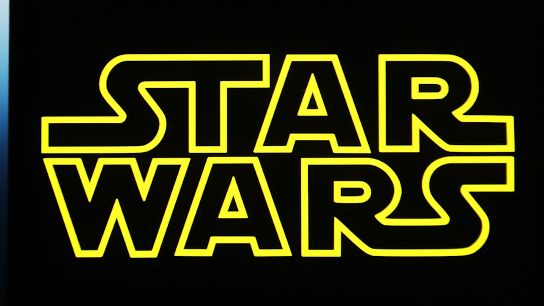 In this photo illustration, a Star Wars logo is seen on a...