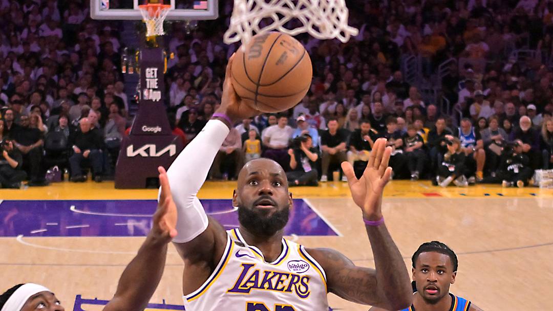 May 9, 2026; Los Angeles, California, USA; Los Angeles Lakers forward LeBron James (23) drives past Oklahoma City Thunder guard Luguentz Dort (5) during game three of the second round of the 2026 NBA Playoffs at Crypto.com Arena. Mandatory Credit: Jayne Kamin-Oncea-Imagn Images