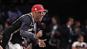 Oct 20, 2024; Brooklyn, New York, USA; Actor and filmmaker Spike Lee cheers during game five of the 2024 WNBA Finals at Barclays Center.