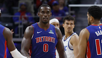 Oct 29, 2025; Detroit, Michigan, USA; Detroit Pistons center Jalen Duren (0) receives congratulations from guard Caris LeVert (8) and forward Tobias Harris (12) in the first half against the Orlando Magic at Little Caesars Arena. Mandatory Credit: Rick Osentoski-Imagn Images
