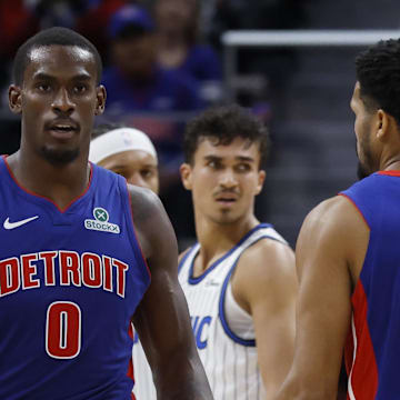Oct 29, 2025; Detroit, Michigan, USA; Detroit Pistons center Jalen Duren (0) receives congratulations from guard Caris LeVert (8) and forward Tobias Harris (12) in the first half against the Orlando Magic at Little Caesars Arena. Mandatory Credit: Rick Osentoski-Imagn Images
