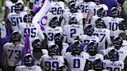 Nov 15, 2025; Provo, Utah, USA; The Texas Christian University Horned Frogs enter the field before the game against the BYU Cougars at LaVell Edwards Stadium. Mandatory Credit: Rob Gray-Imagn Images