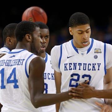 Anthony Davis (center) is congratulated by teammates during the 2012 men's Final Four.