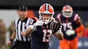 Nov 15, 2025; Champaign, Illinois, USA; Illinois Fighting Illini wide receiver Hudson Clement (13) reacts after a catch and run during the first half against the Maryland Terrapins at Memorial Stadium. Mandatory Credit: Ron Johnson-Imagn Images