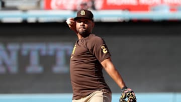 Oct 6, 2024; Los Angeles, California, USA; San Diego Padres second baseman Xander Bogaerts (2) warms up before game two against the Los Angeles Dodgers in the NLDS for the 2024 MLB Playoffs at Dodger Stadium. Mandatory Credit: Kiyoshi Mio-Imagn Images