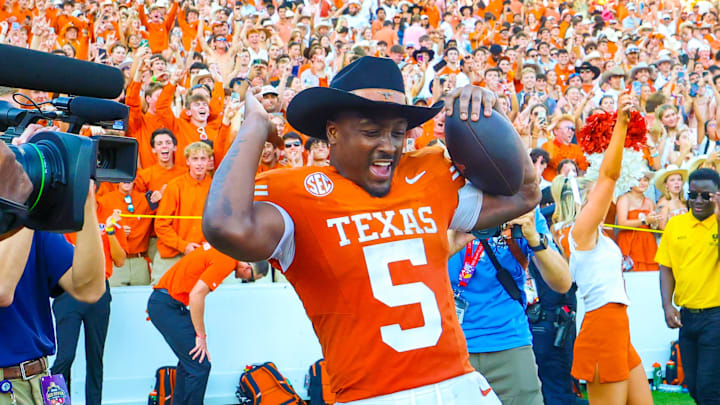 Oct 11, 2025; Dallas, Texas, USA;  Texas Longhorns running back Quintrevion Wisner (5) celebrates after the game against the Oklahoma Sooners at the Cotton Bowl. Mandatory Credit: Kevin Jairaj-Imagn Images