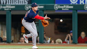 Sep 19, 2023; Arlington, Texas, USA; Boston Red Sox first baseman Bobby Dalbec (29) fields a ground ball during the second inning against the Texas Rangers at Globe Life Field.