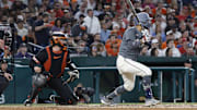 May 7, 2024; Washington, District of Columbia, USA; Washington Nationals outfielder Eddie Rosario (8) hits an RBI single against the Baltimore Orioles during the seventh inning at Nationals Park.