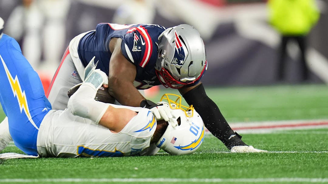 Jan 11, 2026; Foxborough, MA, USA; New England Patriots defensive end Milton Williams (97) sacks Los Angeles Chargers quarterback Justin Herbert (10) during the fourth quarter in an AFC Wild Card Round game at Gillette Stadium. Mandatory Credit: David Butler II-Imagn Images Jan 11, 2026; Foxborough, MA, USA; New England Patriots defensive end Milton Williams (97) sacks Los Angeles Chargers quarterback Justin Herbert (10) during the fourth quarter in an AFC Wild Card Round game at Gillette Stadium. Mandatory Credit: David Butler II-Imagn Images