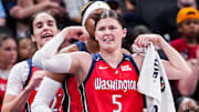 Washington Mystics guard Jade Melbourne celebrates her teammates during a game aaginst the Indiana Fever. 