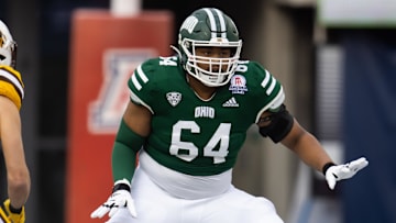 Dec 30, 2022; Tucson, AZ, USA; Ohio Bobcats offensive lineman Shedrick Rhodes Jr. (64) against the Wyoming Cowboys during the 2022 Barstool Sports Arizona Bowl at Arizona Stadium. Mandatory Credit: Mark J. Rebilas-Imagn Images