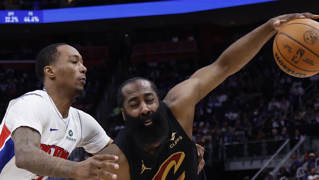 May 7, 2026; Detroit, Michigan, USA; Cleveland Cavaliers guard James Harden (1) dribbles defended by Detroit Pistons forward Ronald Holland II (5) in the first half during game two of the second round of the 2026 NBA Playoffs at Little Caesars Arena. Mandatory Credit: Rick Osentoski-Imagn Images