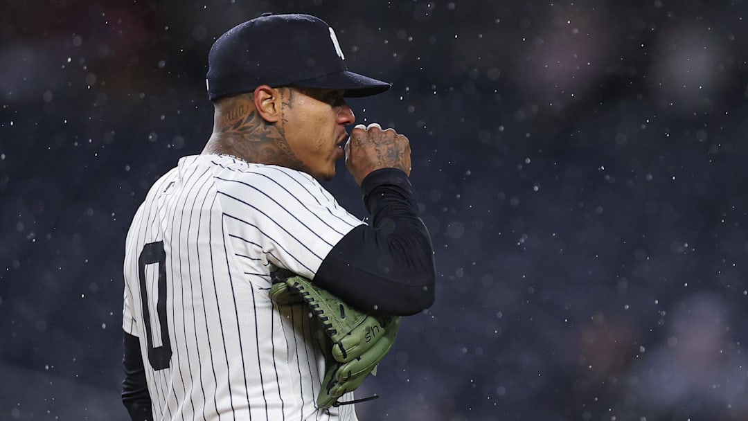 Apr 11, 2025; Bronx, New York, USA; New York Yankees starting pitcher Marcus Stroman (0) reacts during the first inning against the San Francisco Giants at Yankee Stadium. Mandatory Credit: Vincent Carchietta-Imagn Images