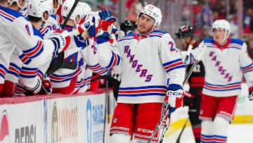Nov 27, 2024; Raleigh, North Carolina, USA;  New York Rangers center Jonny Brodzinski (22) celebrates his goal against the Carolina Hurricanes during the first period at Lenovo Center. Mandatory Credit: James Guillory-Imagn Images