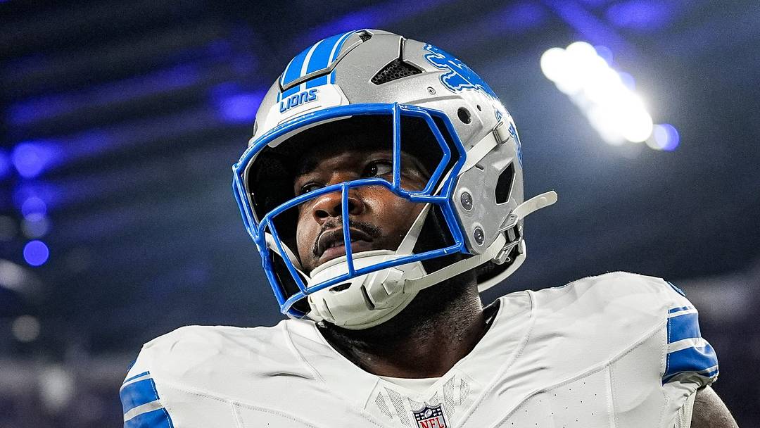 Detroit Lions edge rusher Derrick Moore (8) warms up before Bills game