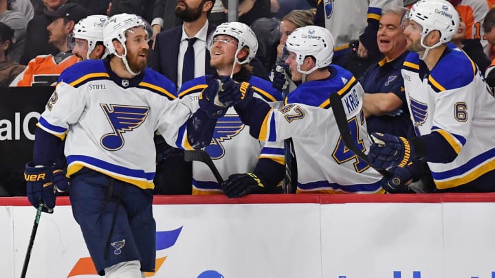 Mar 4, 2024; Philadelphia, Pennsylvania, USA; St. Louis Blues right wing Kevin Hayes (12) celebrates his goal with defenseman Torey Krug (47) and defenseman Marco Scandella (6) against the Philadelphia Flyers during the second period at Wells Fargo Center. Mandatory Credit: Eric Hartline-USA TODAY Sports