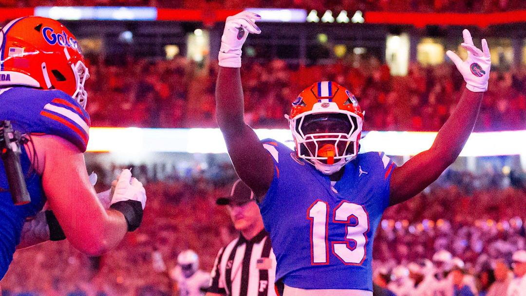 Florida Gators running back Jadan Baugh (13) celebrates his touchdown during the first half at Ben Hill Griffin Stadium in Gainesville, FL on Saturday, October 19, 2024 against the Kentucky Wildcats. [Doug Engle/Gainesville Sun]