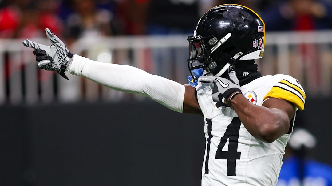 Former Pittsburgh Steelers wide receiver George Pickens (14) reacts after a catch against the Atlanta Falcons in the third quarter at Mercedes-Benz Stadium.
