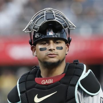 Aug 2, 2024; Pittsburgh, Pennsylvania, USA;  Arizona Diamondbacks catcher Gabriel Moreno (14) looks on against the Pittsburgh Pirates during the fifth inning at PNC Park. Mandatory Credit: Charles LeClaire-USA TODAY Sports