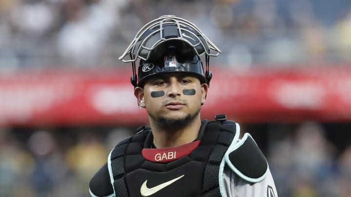 Aug 2, 2024; Pittsburgh, Pennsylvania, USA;  Arizona Diamondbacks catcher Gabriel Moreno (14) looks on against the Pittsburgh Pirates during the fifth inning at PNC Park. Mandatory Credit: Charles LeClaire-USA TODAY Sports