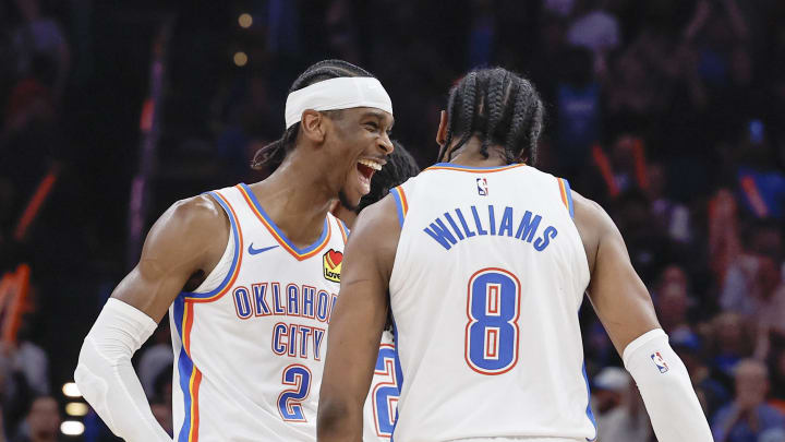 Mar 14, 2024; Oklahoma City, Oklahoma, USA; Oklahoma City Thunder guard Shai Gilgeous-Alexander (2) celebrates with forward Jalen Williams (8) after he dunked against the Dallas Mavericks during the second half at Paycom Center. Mandatory Credit: Alonzo Adams-USA TODAY Sports