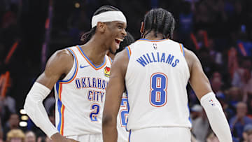 Mar 14, 2024; Oklahoma City, Oklahoma, USA; Oklahoma City Thunder guard Shai Gilgeous-Alexander (2) celebrates with forward Jalen Williams (8) after he dunked against the Dallas Mavericks during the second half at Paycom Center. Mandatory Credit: Alonzo Adams-Imagn Images