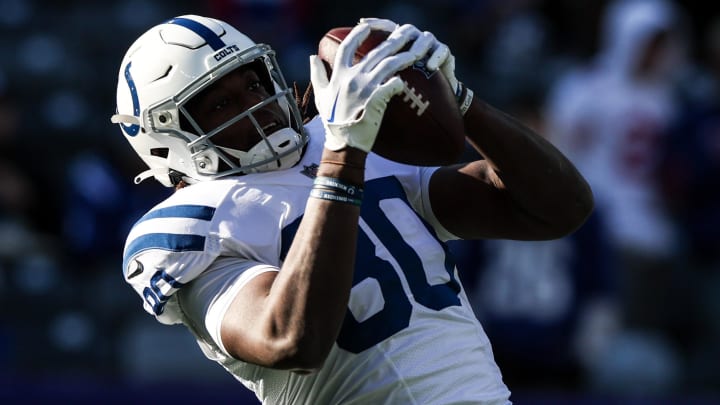 Jan 1, 2023; East Rutherford, New Jersey, USA; Indianapolis Colts tight end Jelani Woods (80) catches the ball during warm ups before the game against the New York Giants at MetLife Stadium. 