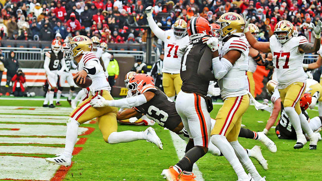 Nov 30, 2025; Cleveland, Ohio, USA; San Francisco 49ers quarterback Brock Purdy (13) scores a touchdown during the second half against the Cleveland Browns at Huntington Bank Field. Mandatory Credit: Ken Blaze-Imagn Images Nov 30, 2025; Cleveland, Ohio, USA; San Francisco 49ers quarterback Brock Purdy (13) scores a touchdown during the second half against the Cleveland Browns at Huntington Bank Field. Mandatory Credit: Ken Blaze-Imagn Images
