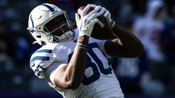 Jan 1, 2023; East Rutherford, New Jersey, USA; Indianapolis Colts tight end Jelani Woods (80) catches the ball during warm ups before the game against the New York Giants at MetLife Stadium. Mandatory Credit: Vincent Carchietta-USA TODAY Sports