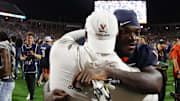 Sep 26, 2025; Charlottesville, Virginia, USA; Virginia Cavaliers running back J'Mari Taylor (3) celebrates after the Cavaliers' win against against the Florida State Seminoles in two overtimes at Scott Stadium. Mandatory Credit: Geoff Burke-Imagn Images