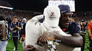 Sep 26, 2025; Charlottesville, Virginia, USA; Virginia Cavaliers running back J'Mari Taylor (3) celebrates after the Cavaliers' win against against the Florida State Seminoles in two overtimes at Scott Stadium. Mandatory Credit: Geoff Burke-Imagn Images