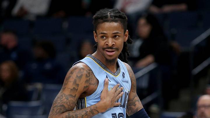 Jan 21, 2026; Memphis, Tennessee, USA; Memphis Grizzlies guard Ja Morant (12) reacts during the first quarter against the Atlanta Hawks at FedExForum. Mandatory Credit: Petre Thomas-Imagn Images
