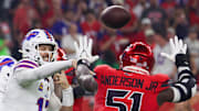 Nov 20, 2025; Houston, Texas, USA; Buffalo Bills quarterback Josh Allen (17) passes against Houston Texans defensive end Will Anderson Jr. (51) in the first quarter at NRG Stadium. 
