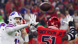 Nov 20, 2025; Houston, Texas, USA; Buffalo Bills quarterback Josh Allen (17) passes against Houston Texans defensive end Will Anderson Jr. (51) in the first quarter at NRG Stadium. 