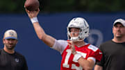 Jun 12, 2025; Indianapolis, IN, USA; Indianapolis Colts quarterback Riley Leonard (15) throws a pass during training camp at the Farm Bureau Football complex. Mandatory Credit: Marc Lebryk-Imagn Images