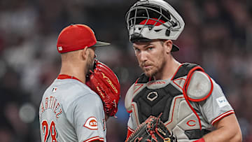 Cincinnati Reds catcher Tyler Stephenson (37) and starting pitcher Nick Martinez