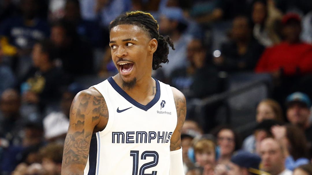 Oct 18, 2024; Memphis, Tennessee, USA; Memphis Grizzlies guard Ja Morant (12) reacts during the second half against the Miami Heat at FedExForum. Mandatory Credit: Petre Thomas-Imagn Images