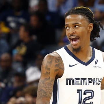 Oct 18, 2024; Memphis, Tennessee, USA; Memphis Grizzlies guard Ja Morant (12) reacts during the second half against the Miami Heat at FedExForum. Mandatory Credit: Petre Thomas-Imagn Images