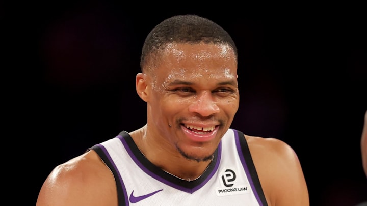 Jan 27, 2026; New York, New York, USA; Sacramento Kings guard Russell Westbrook (18) laughs as he talks to referee Dedric Taylor (21) during the fourth quarter against the New York Knicks at Madison Square Garden. Mandatory Credit: Brad Penner-Imagn Images